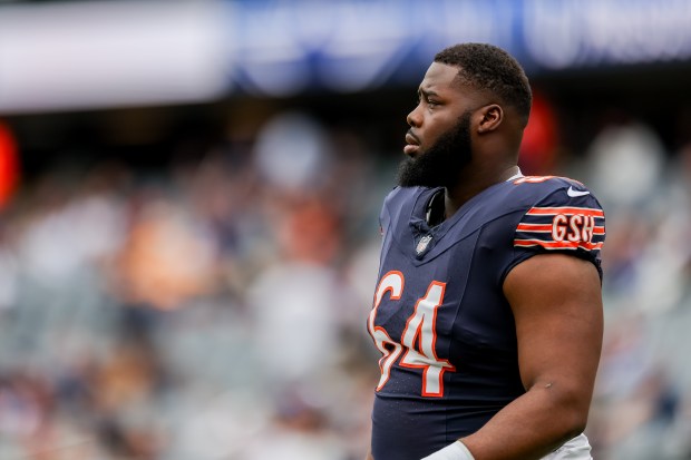 Chicago Bears guard Nate Davis (64) warms up before a game against the Los Angeles Rams at Soldier Field on Sept. 29, 2024. The Bears won 24-18 against the Rams. (Tess Crowley/Chicago Tribune)