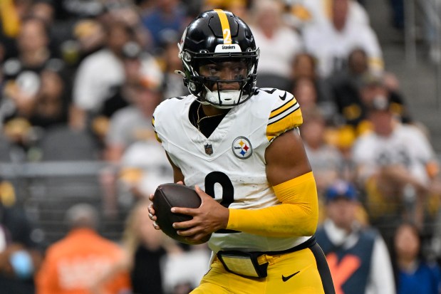 Steelers quarterback Justin Fields handles the ball against the Raiders on Sunday, Oct 13, 2024, in Las Vegas. (AP Photo/David Becker)