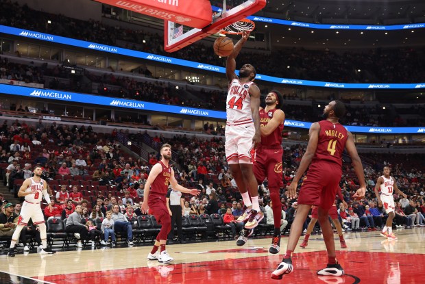 Bulls forward Patrick Williams dunks in the first quarter against the Cavaliers on Oct. 18, 2024, at the United Center. (John J. Kim/Chicago Tribune)