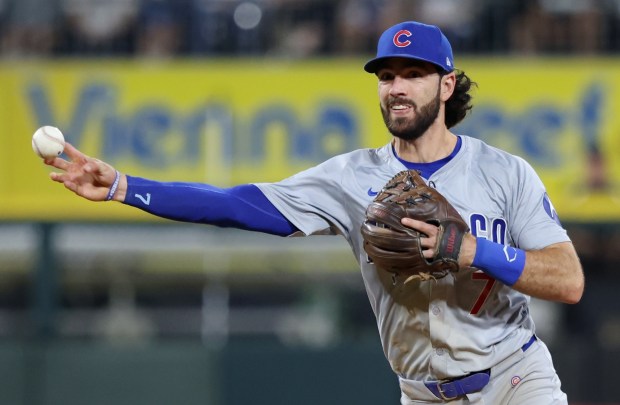 Cubs shortstop Dansby Swanson throws to first base for an out against the White Sox in the fifth inning at Guaranteed Rate Field on Aug. 9, 2024, in Chicago. (John J. Kim/Chicago Tribune)