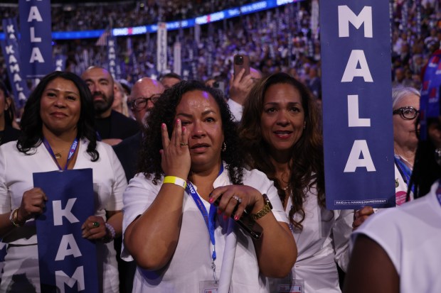 California delegate Shay Franco-Clausen cries as Democratic presidential nominee Vice President Kamala Harris takes the stage on Aug. 22, 2024, during the Democratic National Convention at the United Center. (Brian Cassella/Chicago Tribune)