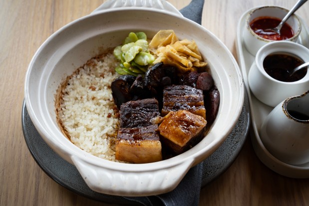 Clay Pot Rice - Yamagata koshihkari, pork belly, lap cheong, shiitake, yuba, fava bean at Maxwells Trading. (E. Jason Wambsgans/Chicago Tribune)