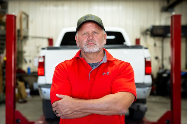 Ray Treuthart, owner of Treu Body Works, at his shop in Lincoln on Oct. 2, 2024. (Tess Crowley/Chicago Tribune)