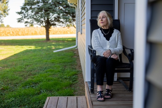 Realtor Diane Schriber poses at a newly constructed home in Lincoln on Oct. 2, 2024. (Tess Crowley/Chicago Tribune)