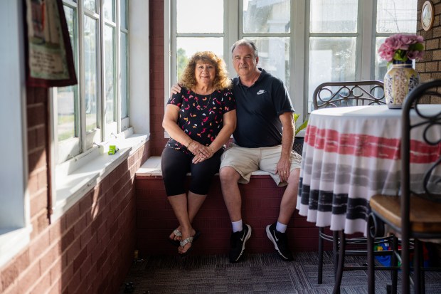 Patrick Fuller, right, and wife Priscilla Fuller at their home in Lincoln on Oct. 2, 2024. (Tess Crowley/Chicago Tribune)