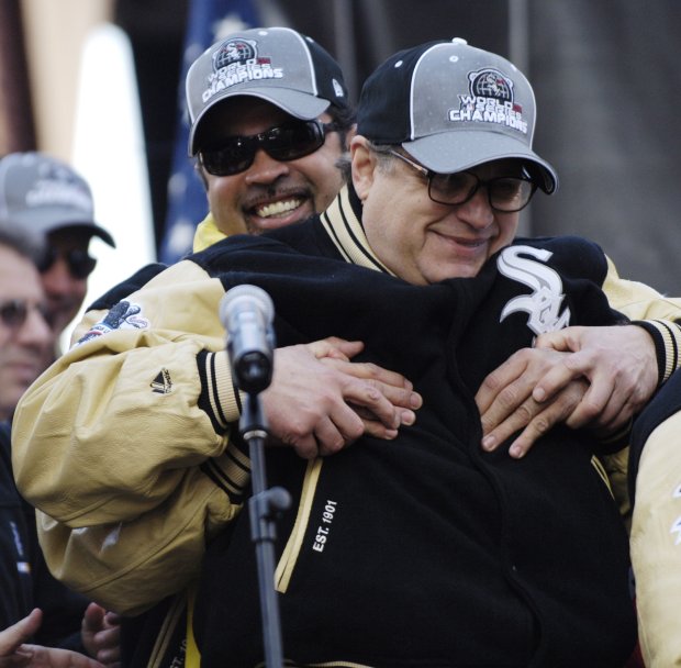 White Sox manager Ozzie Guillen hugs Chairman Jerry Reinsdorf during a World Series parade and rally in the Loop on Oct. 28, 2005. (Chris Walker/Chicago Tribune)