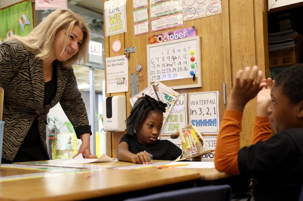 Chicago Public Schools Chief Education Officer Bogdana Chkoumbova talks with third grade students at Chalmers STEAM Elementary School in Chicago, Tuesday, Oct. 15, 2024.STEM stands for Science, Technology, Engineering, Arts, and Mathematics. Last week City Council approved $10 million dollars in TIF funding toward three schools in North Lawndale. (Antonio Perez/Chicago Tribune)