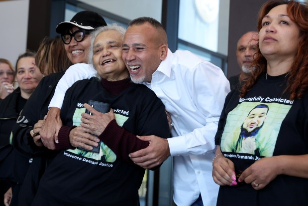 Family members of Alexander Villa, including his grandmother Bernadina Gabriella, and other supporters celebrate after a judge vacated the case against Villa, who was convicted of killing police Officer Clifton Lewis, at the Leighton Criminal Court Building on Oct. 2, 2024. (Antonio Perez/Chicago Tribune)