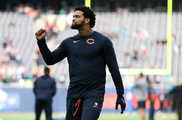 Bears quarterback Caleb Williams warms up for a game against the Jaguars on Oct. 13, 2024, at Tottenham Hotspur Stadium in London. (Chris Sweda/Chicago Tribune)