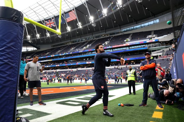 Chicago Bears quarterback Caleb Williams warms up for a game against the Jacksonville Jaguars at Tottenham Hotspur Stadium in London on Oct. 13, 2024. (Chris Sweda/Chicago Tribune)