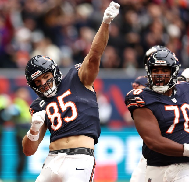 Chicago Bears tight end Cole Kmet (85) celebrates after scoring a touchdown in the first quarter of a game against the Jacksonville Jaguars at Tottenham Hotspur Stadium in London on Oct. 13, 2024. (Chris Sweda/Chicago Tribune)