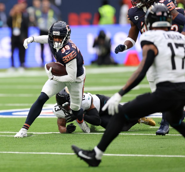 Chicago Bears cornerback Josh Blackwell (39) runs back his interception in the fourth quarter of a game against the Jacksonville Jaguars at Tottenham Hotspur Stadium in London on Oct. 13, 2024. (Chris Sweda/Chicago Tribune)