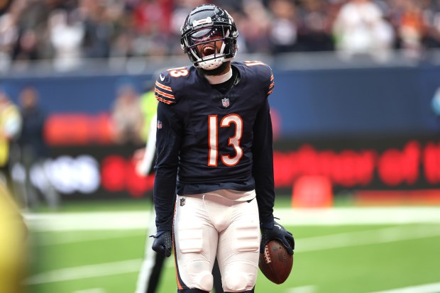 Chicago Bears wide receiver Keenan Allen (13) celebrates after scoring a touchdown in the third quarter of a game against the Jacksonville Jaguars at Tottenham Hotspur Stadium in London on Oct. 13, 2024. (Chris Sweda/Chicago Tribune)