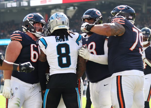 The Panthers' Jaycee Horn, center, and the Bears' Bill Murray, left, and Matt Pryor are involved in an altercation during the fourth quarter at Soldier Field on Oct. 6, 2024. Pryor was kicked out the game. (Chris Sweda/Chicago Tribune)