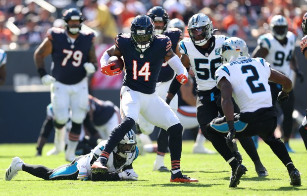 Bears tight end Gerald Everett gains some extra yards after a reception in the second quarter against the Panthers on Oct. 6, 2024, at Soldier Field. (Chris Sweda/Chicago Tribune)