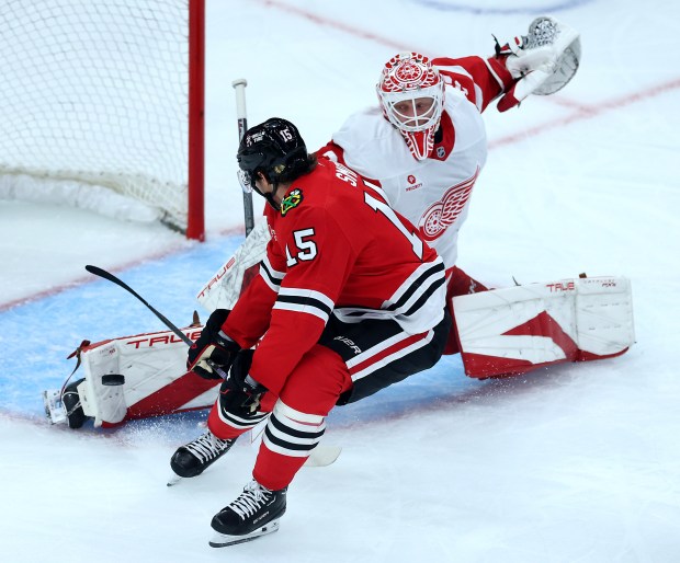 Detroit Red Wings goaltender Ville Husso (35) denies Chicago Blackhawks center Craig Smith (15) from scoring in the first period of a preseason game at the United Center in Chicago on Sept. 25, 2024. (Chris Sweda/Chicago Tribune)