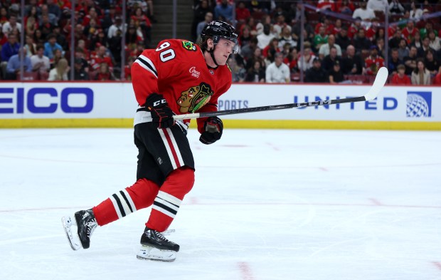 Chicago Blackhawks center Paul Ludwinski (90) skates back on defense in the third period of a preseason game against the Detroit Red Wings at the United Center in Chicago on Sept. 25, 2024. (Chris Sweda/Chicago Tribune)