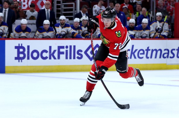 Blackhawks defenseman Alex Vlasic takes a shot on goal in the first period against the Sabres at the United Center on Oct. 19, 2024. (Chris Sweda/Chicago Tribune)