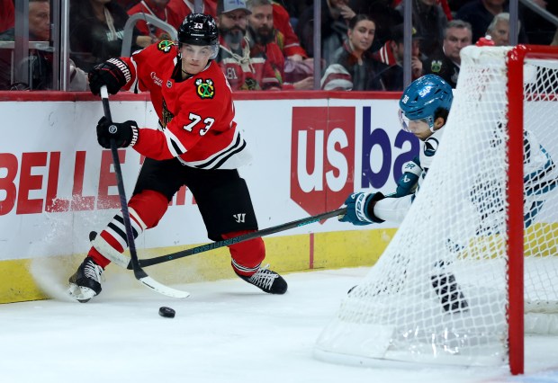 Blackhawks left wing Lukas Reichel makes a move in the first period of the home opener against the Sharks at the United Center on Oct. 17, 2024. (Chris Sweda/Chicago Tribune)