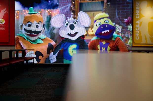 A video screen with characters and a dance floor for kids replaces the animatronic band inside a recently remodeled Chuck E. Cheese in Gage Park, Oct. 17, 2024. (Brian Cassella/Chicago Tribune)