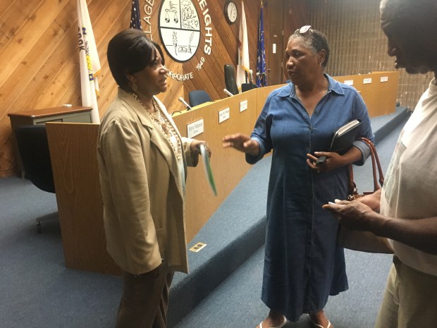 Then Ford Heights Mayor Annie Coulter talks with residents following a village board meeting on May 17, 2017. (Daily Southtown)