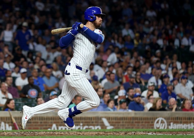 Chicago Cubs right fielder Cody Bellinger drives in a run on a single in the first inning against the Nationals on Sept. 19, 2024, at Wrigley Field. (Chris Sweda/Chicago Tribune)