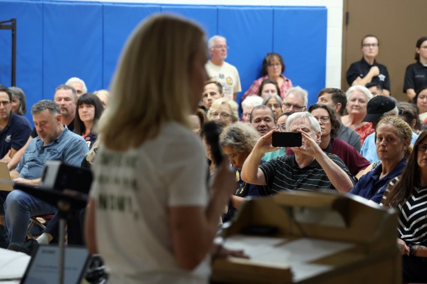 Nicole Foster, of the Restore Gompers Park Coalition, speaks during a public meeting at the Salvation Army Mayfair Community Church in Chicago on Sept. 30, 2024. (Terrence Antonio James/Chicago Tribune)