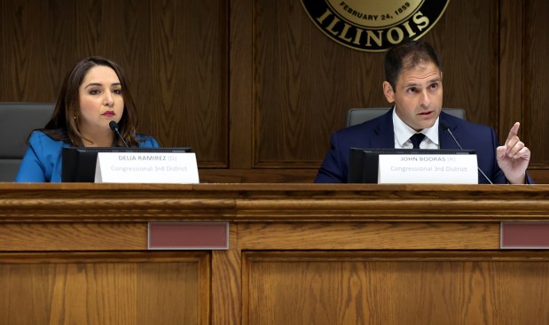 Incumbent U.S. Rep. Delia Ramirez and Republican challenger John Booras participate in a candidate forum for the 3rd Congressional District, Oct. 3, 2024, at Wheaton City Hall. (Chris Sweda/Chicago Tribune)