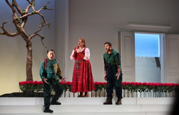 Joo Won Kang, as Rocco, Keely Futterer, as Marcellina, and Alex Soare, in the role of Giachino, perform during opening night of Chicago Opera Theater's Leonora at the Studebaker Theater in the Fine Arts Building on Oct. 1, 2024. (Chris Sweda/Chicago Tribune)