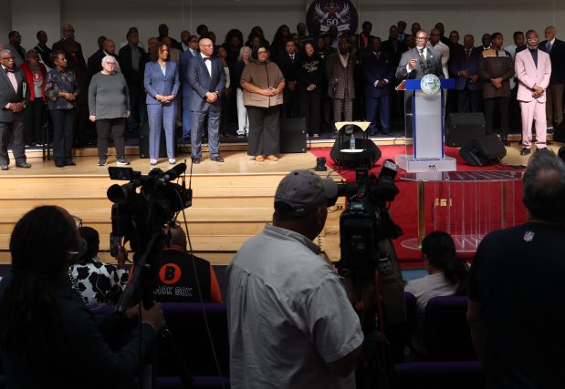 Mayor Brandon Johnson introduces his new Chicago Board of Education on Oct. 7, 2024, at Sweet Holy Spirit Church in Chicago. (Antonio Perez/Chicago Tribune)