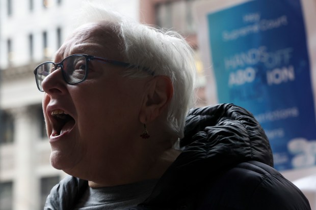 Debby Pope, a member of both the Chicago Teachers Union's Women's Rights Committee and the American Federation of Teachers Women's Rights Committee, speaks during a press conference in support of access to an abortion drug in front of the Dirksen U.S. Courthouse in Chicago on March 26, 2024. (Eileen T. Meslar/Chicago Tribune)