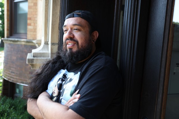 Raymond J. Rodriguez outside his Chicago home on July 26, 2024. Rodriguez signed an election petition but election officials deemed his signature not genuine. The candidate got Rodriguez to sign an affidavit saying he really had signed the petition, but election officials still tossed his signature. (Terrence Antonio James/Chicago Tribune)