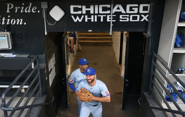 New Royals infielder Paul DeJong walks out of the visitors dugout at Guaranteed Rate Field before a game against his former team, the White Sox, on July 30, 2024. DeJong was traded earlier in the day. (Chris Sweda/Chicago Tribune)