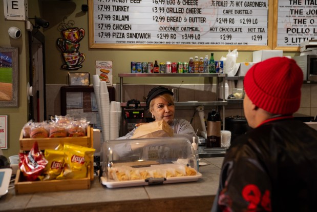 Mabel Sanchez, a manager at La Sandwichera Cafe on Division Street in the Humboldt Park neighborhood, where the morning talk revolved around derogatory comments made about Puerto Rico at a Trump rally the day before. (E. Jason Wambsgans/Chicago Tribune)