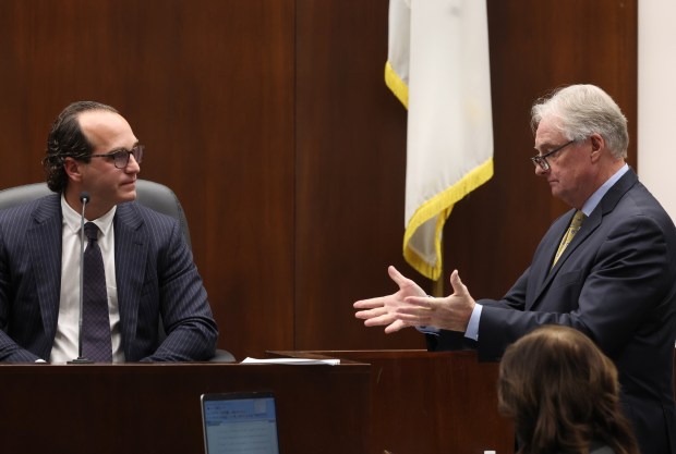 Attorney James McKay, right, questions witness Elliot Slosar during the trial of two former Cook County assistant state's attorneys, Nicholas Trutenko and Andrew Horvat at the courthouse in Rolling Meadows on Oct. 24, 2024. (Stacey Wescott/Chicago Tribune)