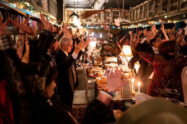 John Bitinas participates in an ancestor ritual on Oct. 26, 2024, at Malliway Bros. Spells, Charms, & Potions in Chicago. (Vincent Alban/for the Chicago Tribune)