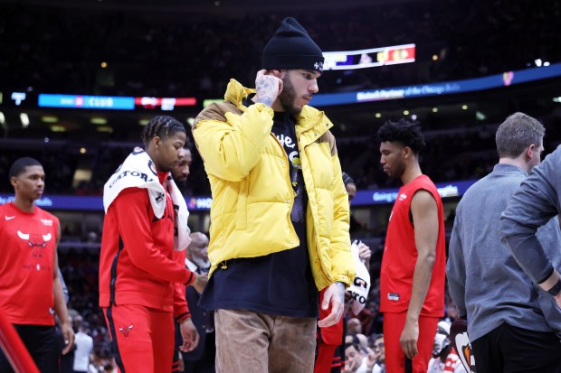 Bulls guard Lonzo Ball is seen in street clothes in the second half of a game against the Hawks at the United Center on Jan. 23, 2023. (Terrence Antonio James/Chicago Tribune)