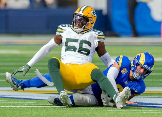 Green Bay Packers linebacker Edgerrin Cooper (56) sacks Los Angeles Rams quarterback Matthew Stafford (9) in the first half of the game at SoFi Stadium in Inglewood on Sunday, Oct. 6, 2024. (Photo by Terry Pierson, The Press-Enterprise/SCNG)