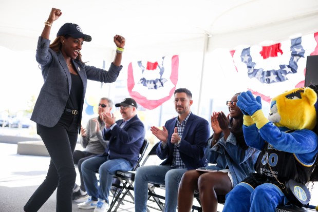 Chicago Sky co-owner and operating chairman Nadia Rawlinson pumps her fists as she is announced during a groundbreaking for the team's new practice facility in Bedford Park on Wednesday, Oct. 9, 2024. (Eileen T. Meslar/Chicago Tribune)