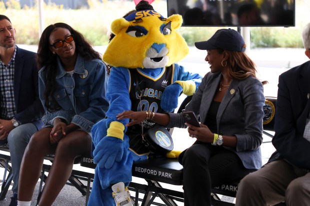 Chicago Sky mascot Skye the Lioness sits with co-owner and operating chairman Nadia Rawlinson during a groundbreaking on the new Chicago Sky practice facility in Bedford Park on Wednesday, Oct. 9, 2024. (Eileen T. Meslar/Chicago Tribune)