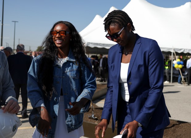 Chicago Sky players Michaela Onyenwere, left, and Elizabeth Williams, joke around during the groundbreaking on the new Chicago Sky practice facility in Bedford Park on Wednesday, Oct. 9, 2024. (Eileen T. Meslar/Chicago Tribune)