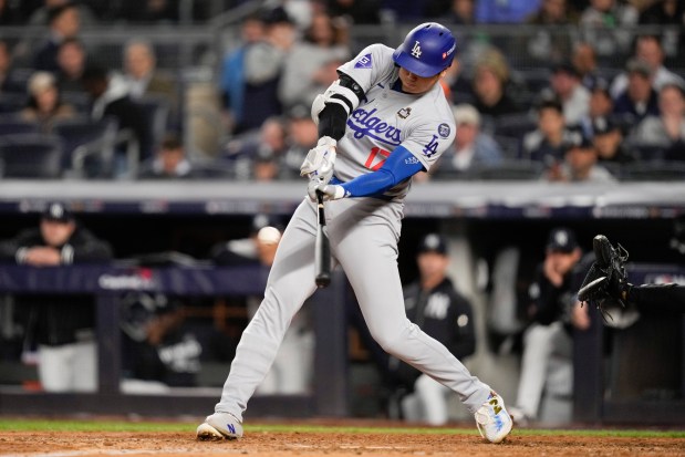 The Dodgers' Shohei Ohtani singles against the Yankees during the fifth inning in Game 4 of the World Series on Oct. 29, 2024, in New York. (AP Photo/Ashley Landis)