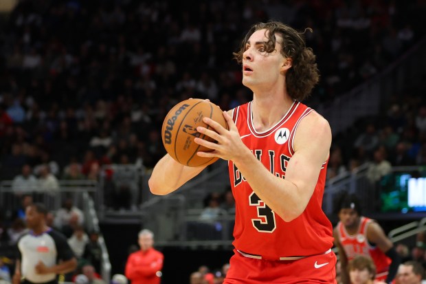 Josh Giddey #3 of the Chicago Bulls takes a three point shot during the first half of a preseason game against the Milwaukee Bucks at Fiserv Forum on Oct. 14, 2024 in Milwaukee, Wisconsin. NOTE TO USER: User expressly acknowledges and agrees that, by downloading and or using this photograph, User is consenting to the terms and conditions of the Getty Images License Agreement. (Photo by Stacy Revere/Getty Images)