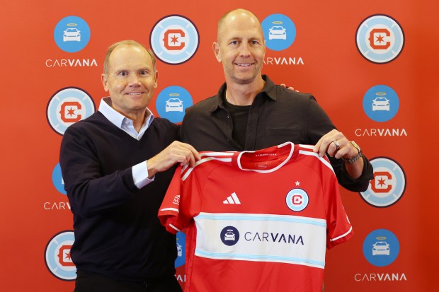 Chicago Fire owner Joe Mansueto, introduces new coach and director of football Gregg Berhalter during a news conference on Oct. 17, 2024, at Waldorf Astoria Chicago. (Michael Reaves/Getty)