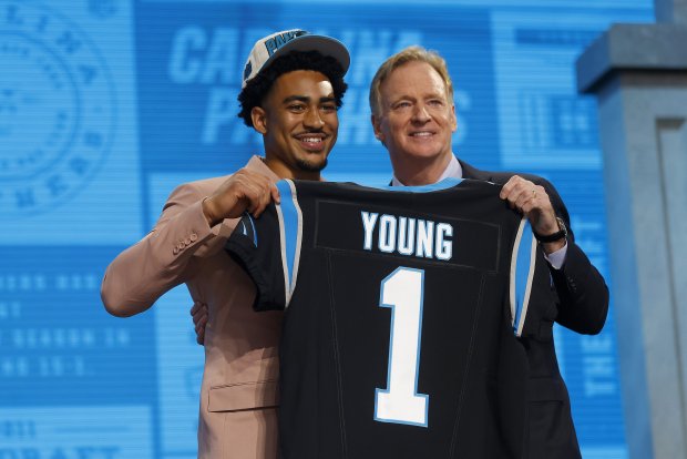 Bryce Young, left, poses with NFL Commissioner Roger Goodell after the Panthers selected the quarterback with the No. 1 pick in the draft on April 27, 2023, in Kansas City, Mo. (David Eulitt/Getty Images/TNS)