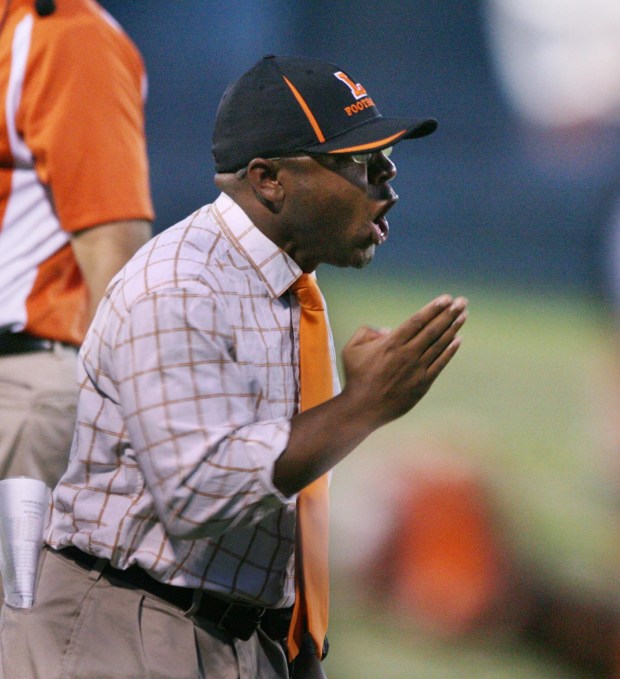 Leesburg High School football coach Randy Trivers yells from the sideline during a game on Sept. 20, 2013, in Leesburg, Fla. (Stephen M. Dowell/Orlando Sentinel)