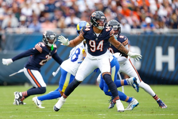 Chicago Bears defensive end Austin Booker (94) defends agains the Los Angeles Rams during the first half of an NFL football game, Sunday, Sept. 29, 2024, in Chicago. The Bears defeated the Rams 24-18. (AP Photo/Kamil Krzaczynski)