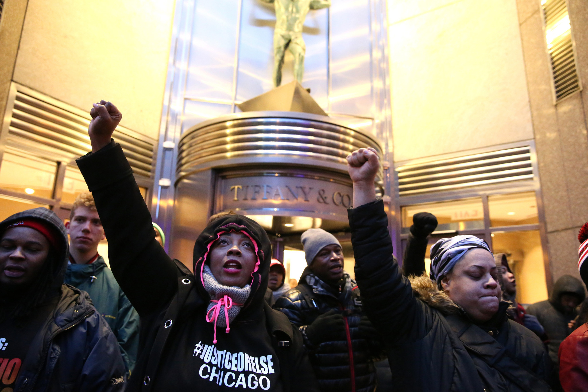 People protesting the shooting death of Laquan McDonald by a...