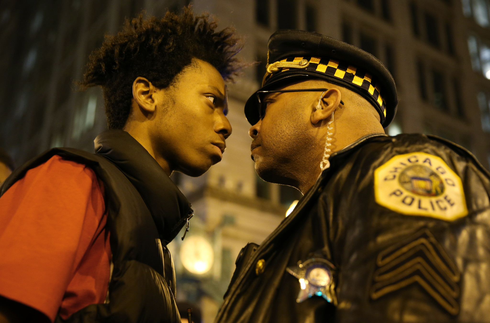 Lamon Reccord stares down a police officer during a march...