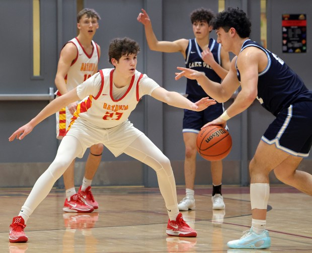 Batavia's Jax Abalos (23) plays defense against Lake Park during a DuKane Conference game in Batavia on Friday, Jan. 19, 2024.